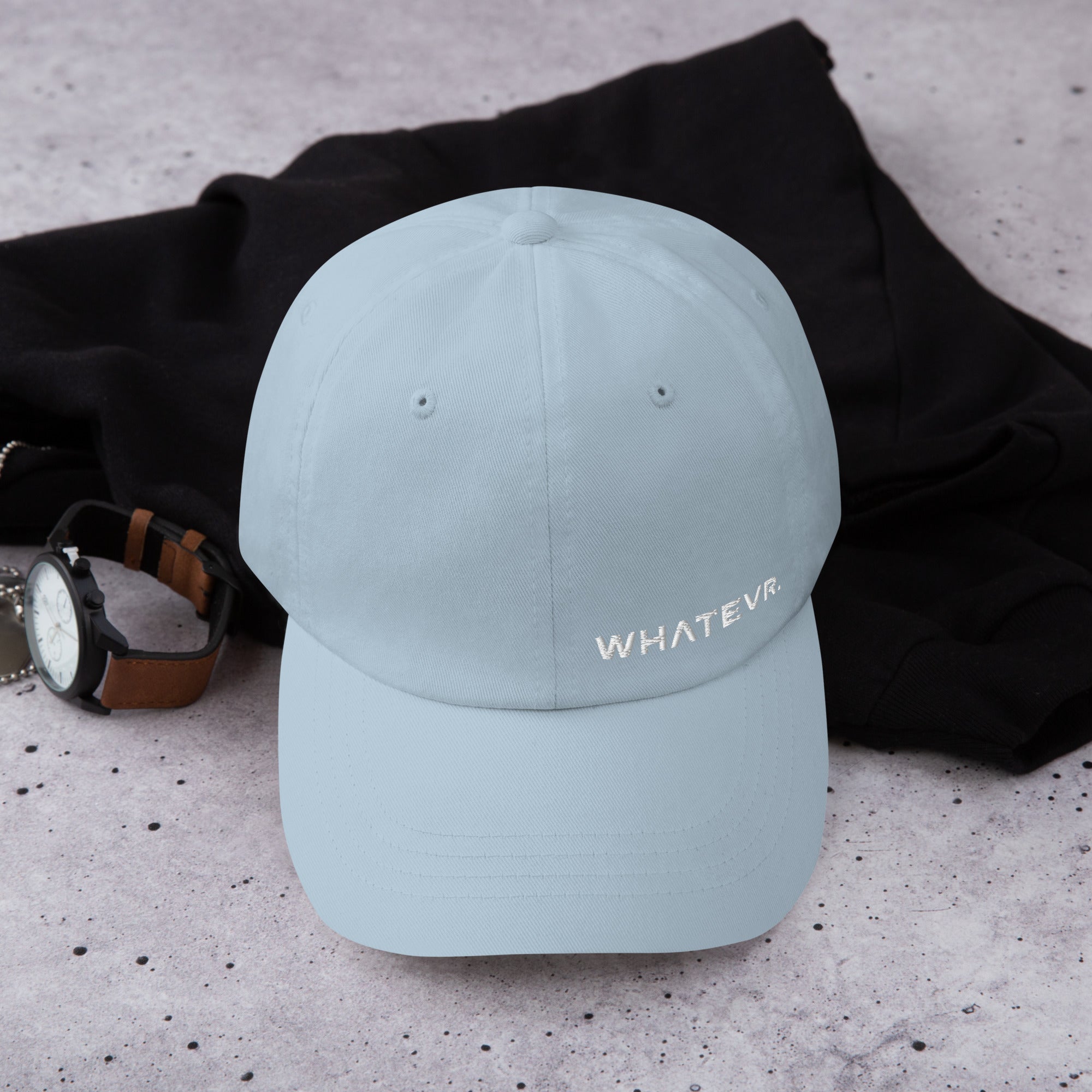 Unisex Classic baseball cap in light blue with embroidered WHATEVR logo, front view