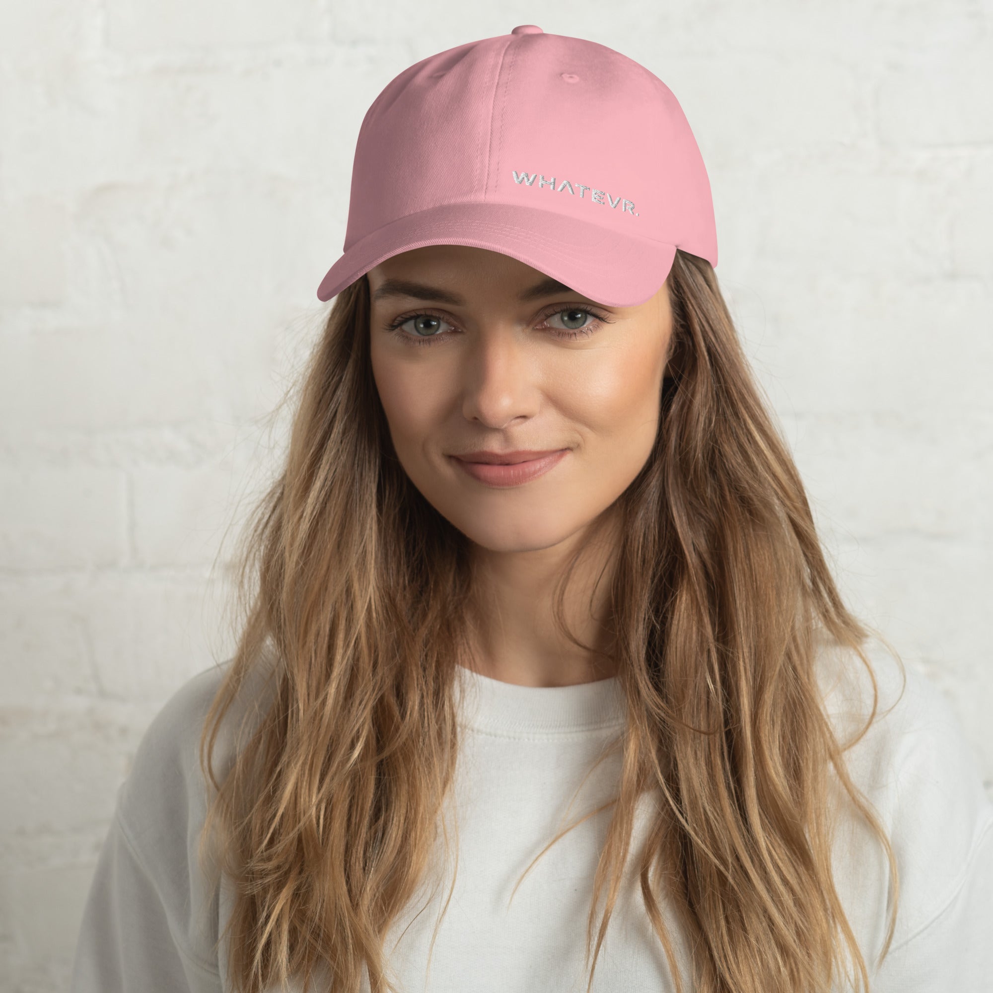 Unisex Classic baseball cap in pink with embroidered WHATEVR logo, front view