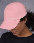 Unisex Classic baseball cap in pink with embroidered WHATEVR logo, front view