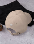 Unisex Classic baseball cap in beige with embroidered WR logo, back view