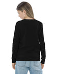 Girls essential long sleeve t-shirt in black, back view.