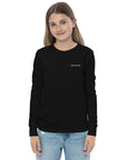 Girls essential long sleeve t-shirt in black, front view.