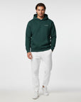 Men's premium heavyweight hoodie in green with "WHATEVR" text, front view