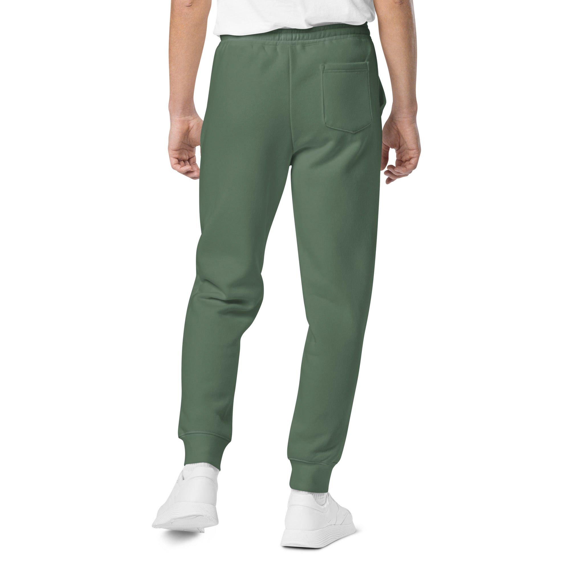 Men's essential relaxed sweatpants in green, back view.