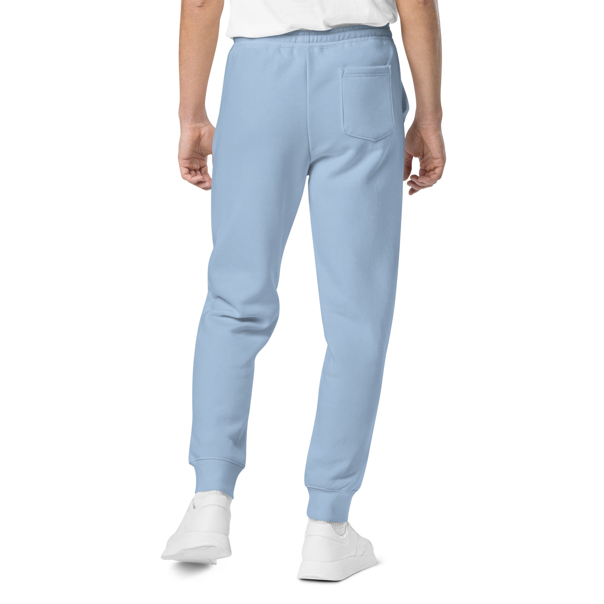 Men's essential relaxed sweatpants in blue, back view.