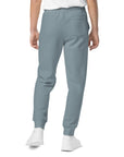 Men's essential relaxed sweatpants in blue, back view.