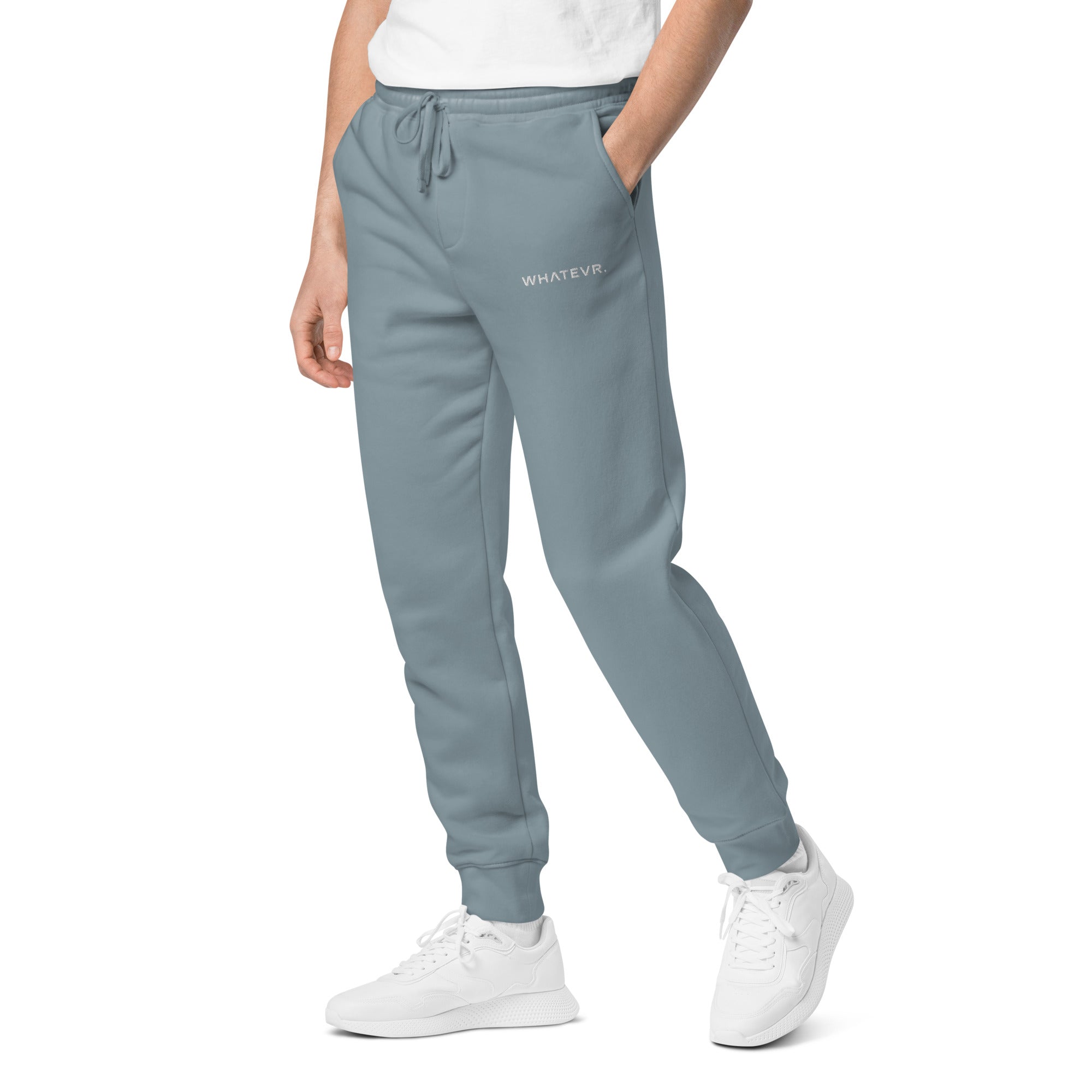 Men's essential relaxed sweatpants in blue with embroidered detailing, front view.