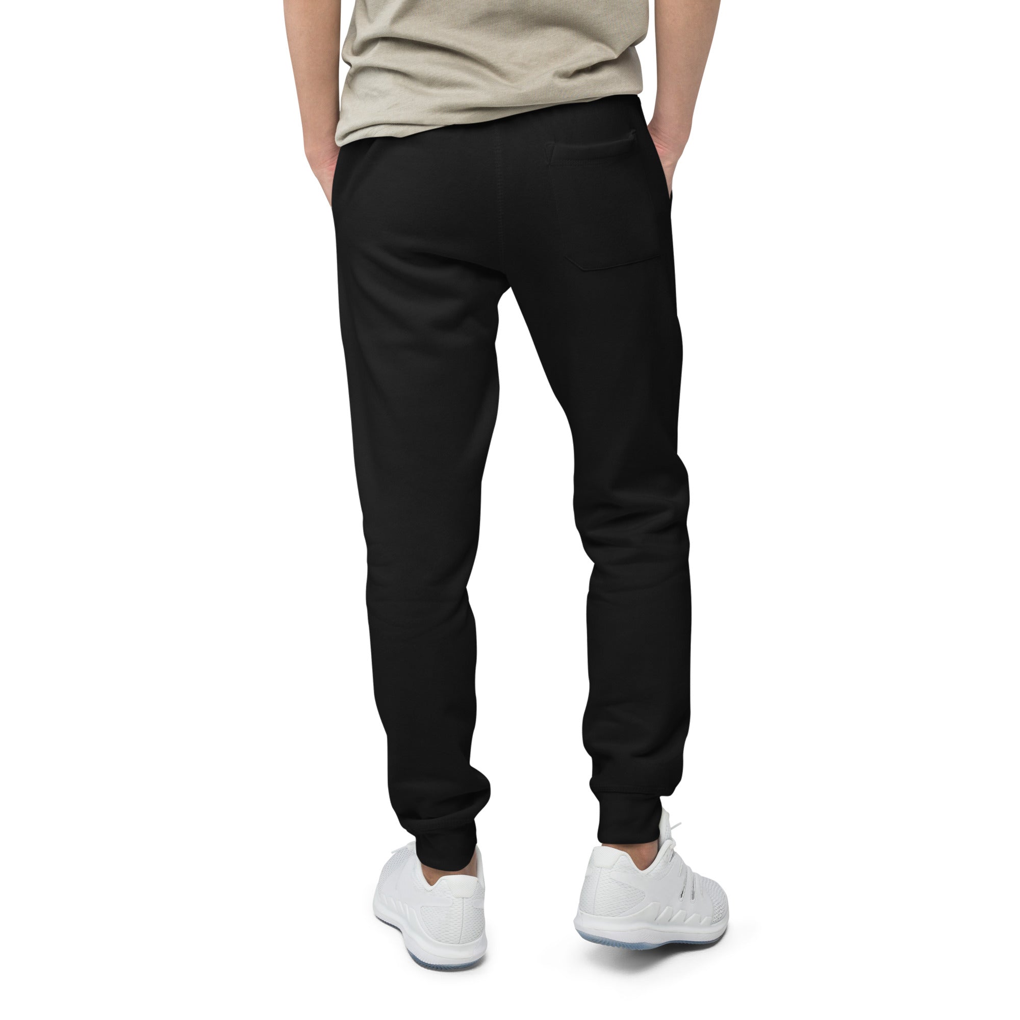 Men's essential slim fit sweatpants in black, back view.
