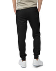 Men's essential slim fit sweatpants in black, back view.