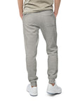Men's essential slim fit sweatpants in light grey, back view.