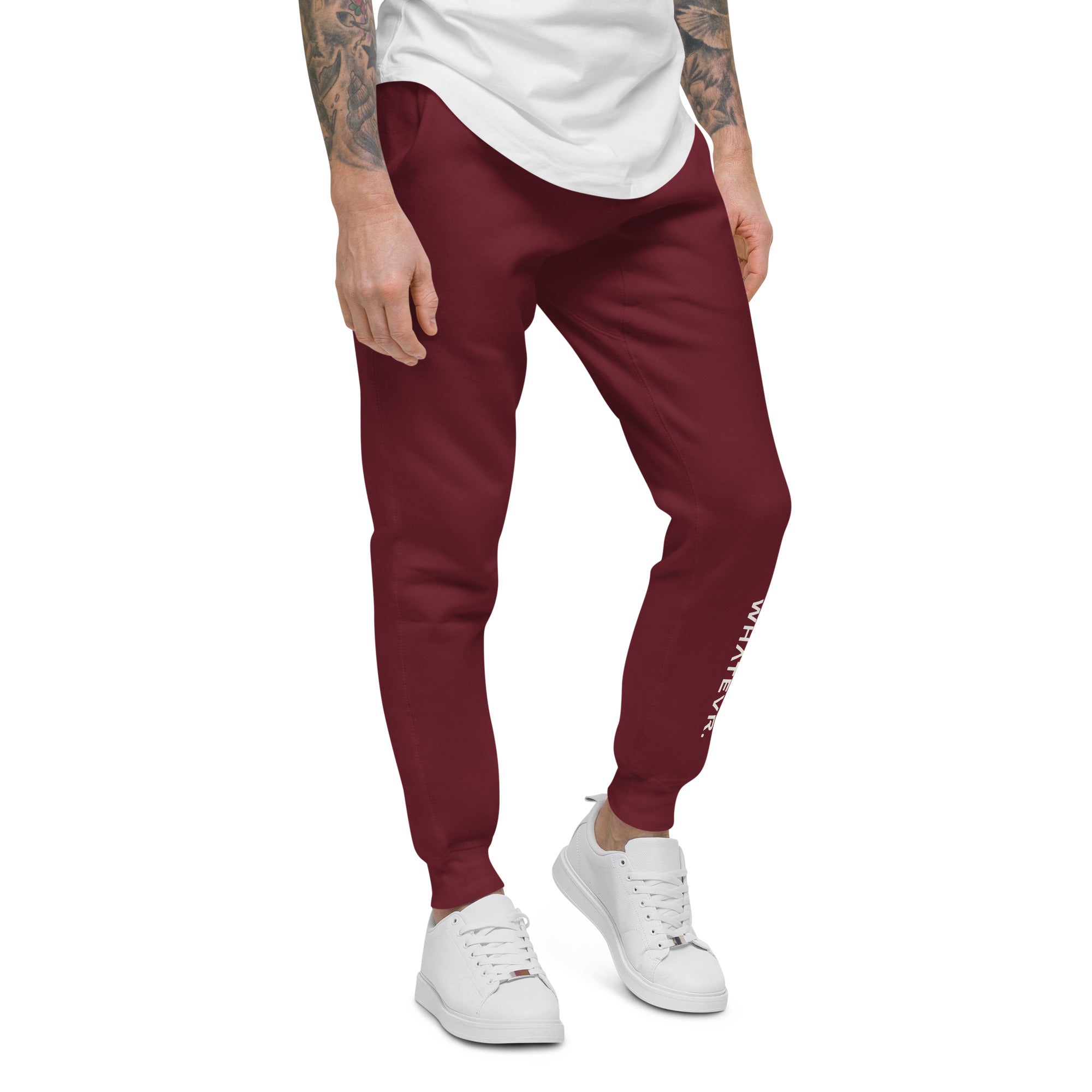 Men's essential slim fit sweatpants in maroon, front view.