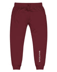 Men's essential slim fit sweatpants in maroon, front view.