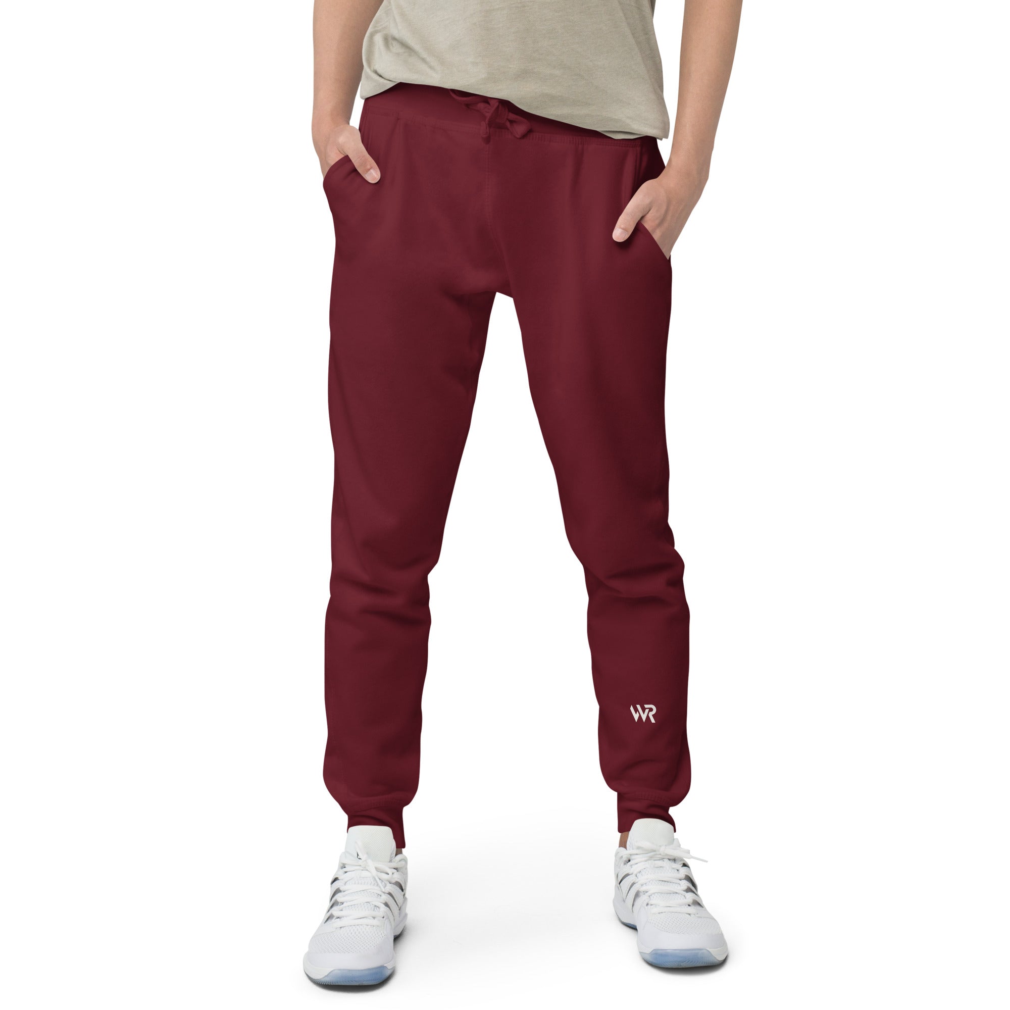 Men's essential slim fit sweatpants in maroon, front view.