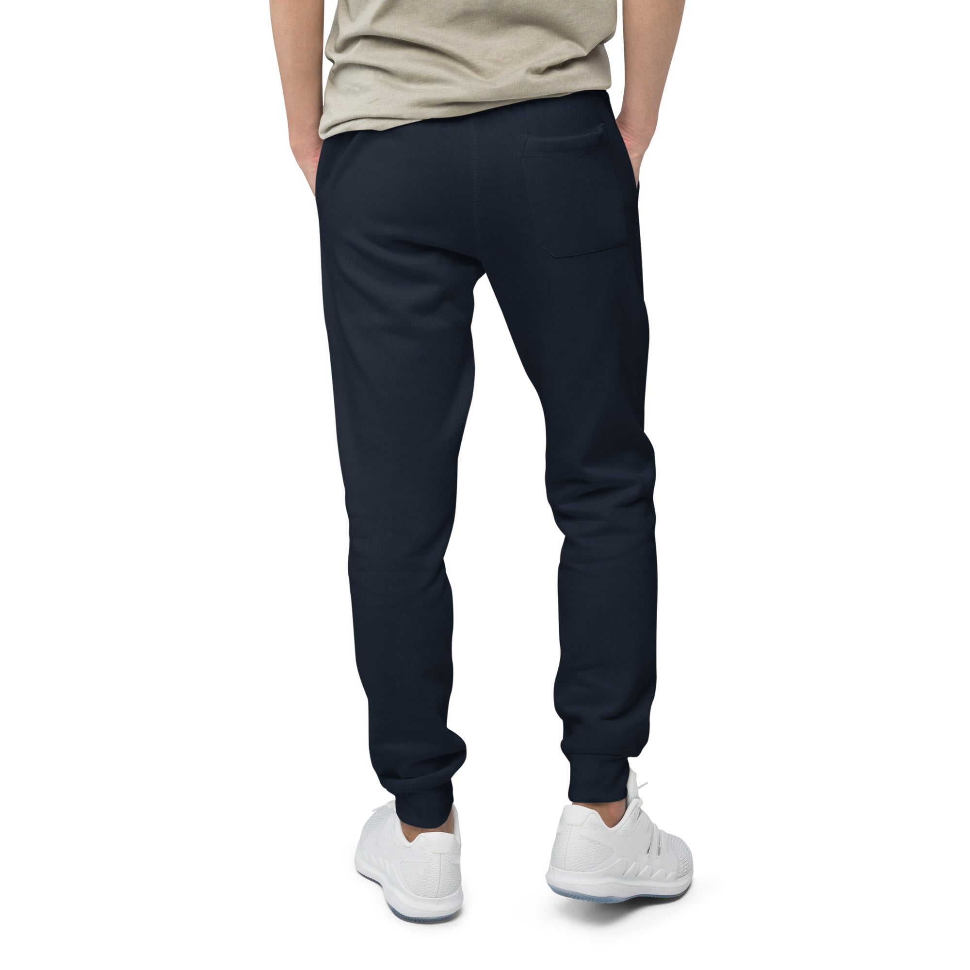 Men's essential slim fit sweatpants in dark blue, back view.