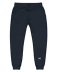 Men's essential slim fit sweatpants in dark blue, front view.