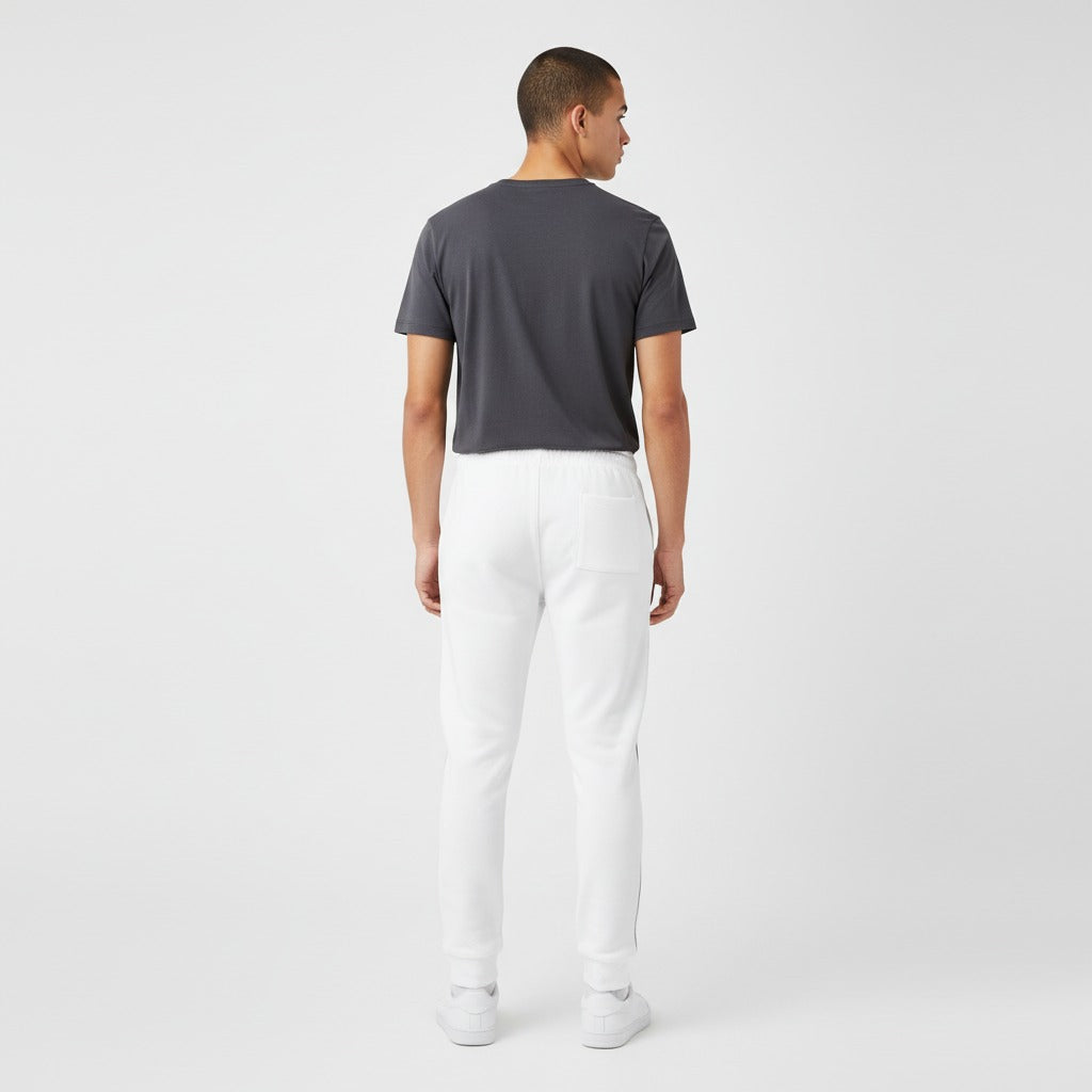 Men's essential slim fit sweatpants in white, back view.