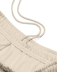 Men's premium heavyweight sweatpants in beige, front view.
