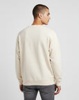 Men's premium crewneck sweatshirt in beige with embroidered detailing, back view
