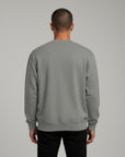 Men's premium crewneck sweatshirt in gray with embroidered detailing, back view