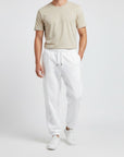 Men's heavyweight fleece sweatpants in white, front view.