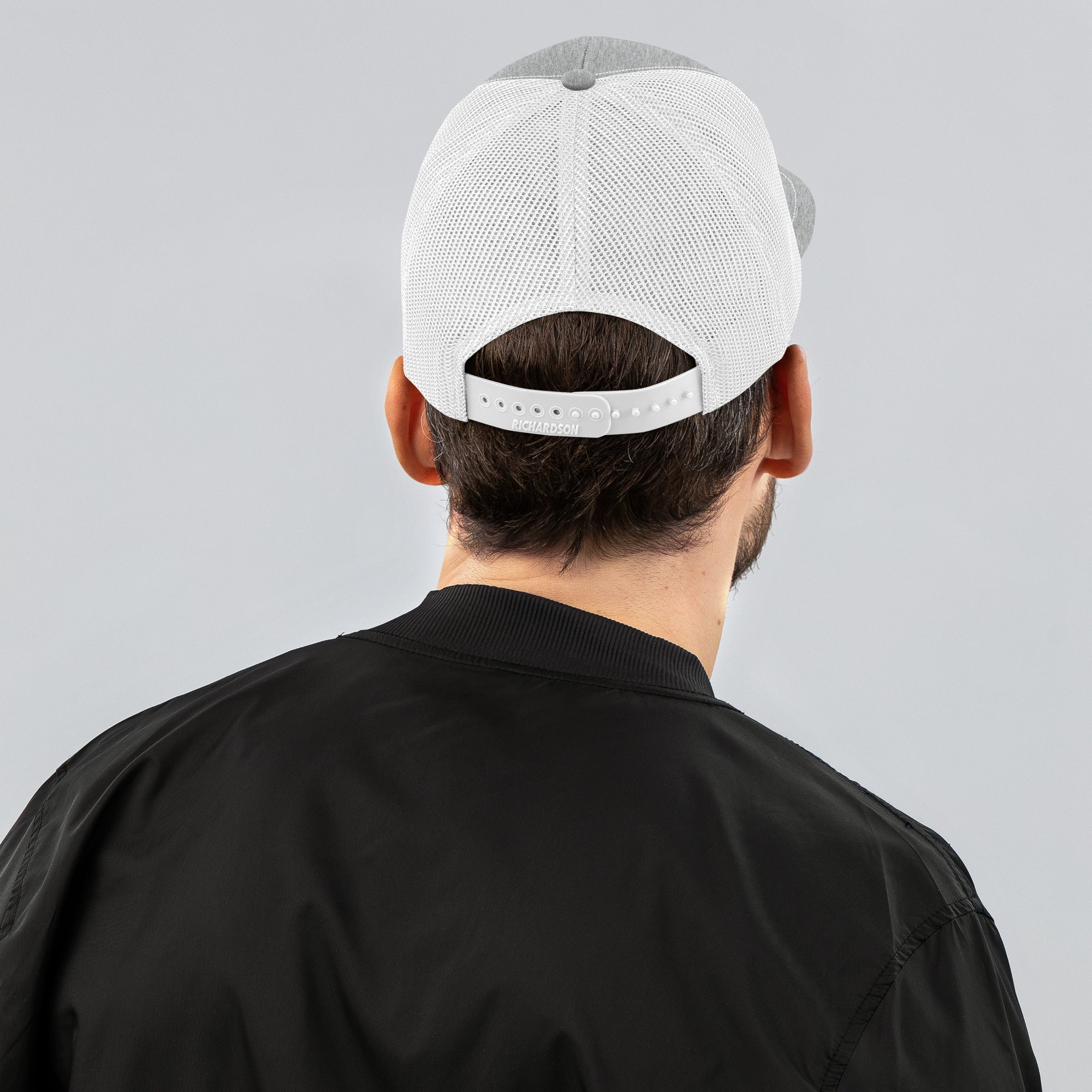 Unisex Signature trucker hat in white and gray with embroidered WR logo, back view