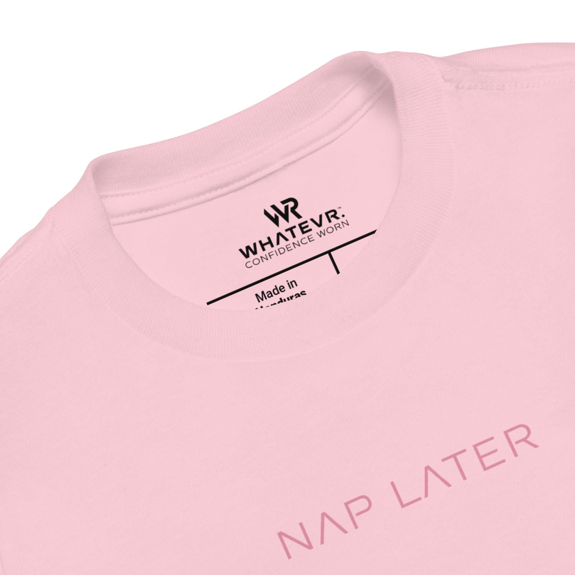 Toddler girl's t-shirt in pink with "Nap Later" text, front view.