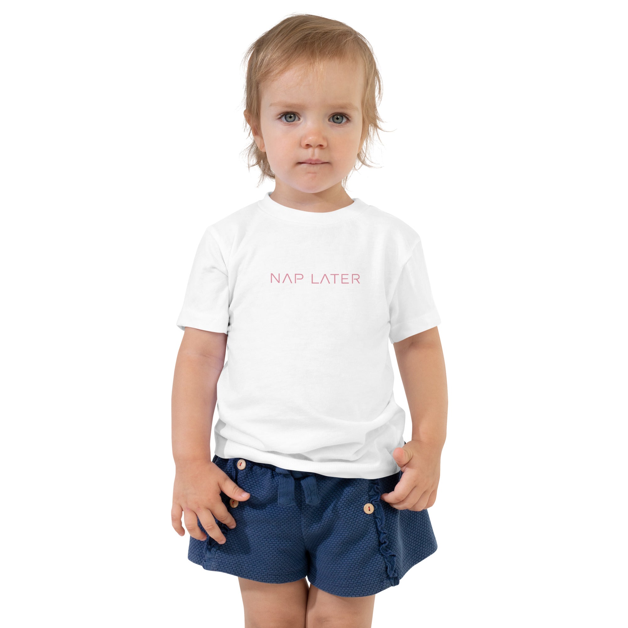 Toddler girl's t-shirt in white with "Nap Later" text, front view.