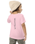 Toddler t-shirt in pink with "WHATEVR" text, back view.