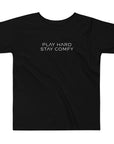 Toddler t-shirt in black with "Play Hard Stay Comfy" text, front view.
