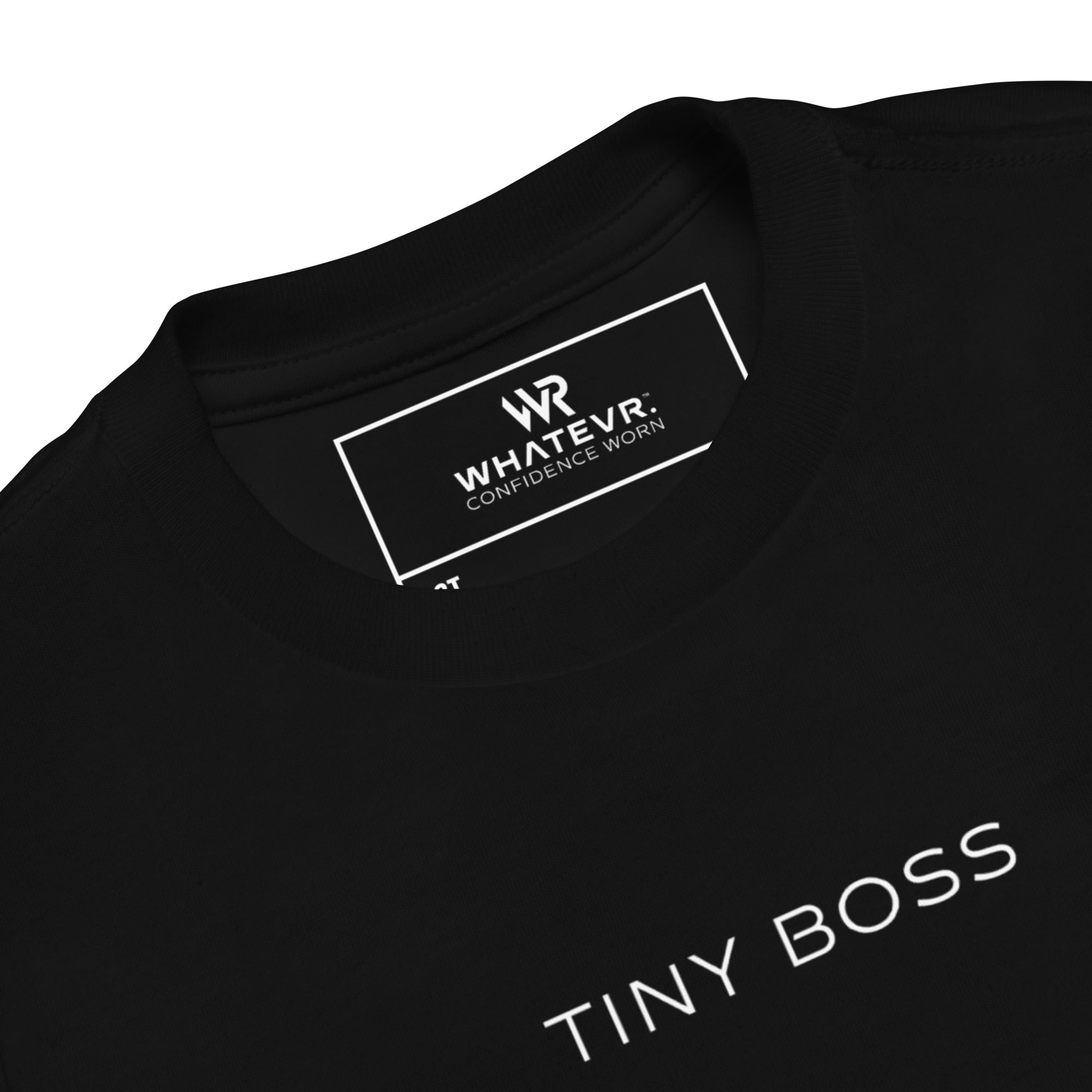 Toddler t-shirt in black with "Tiny Boss" text, front view.