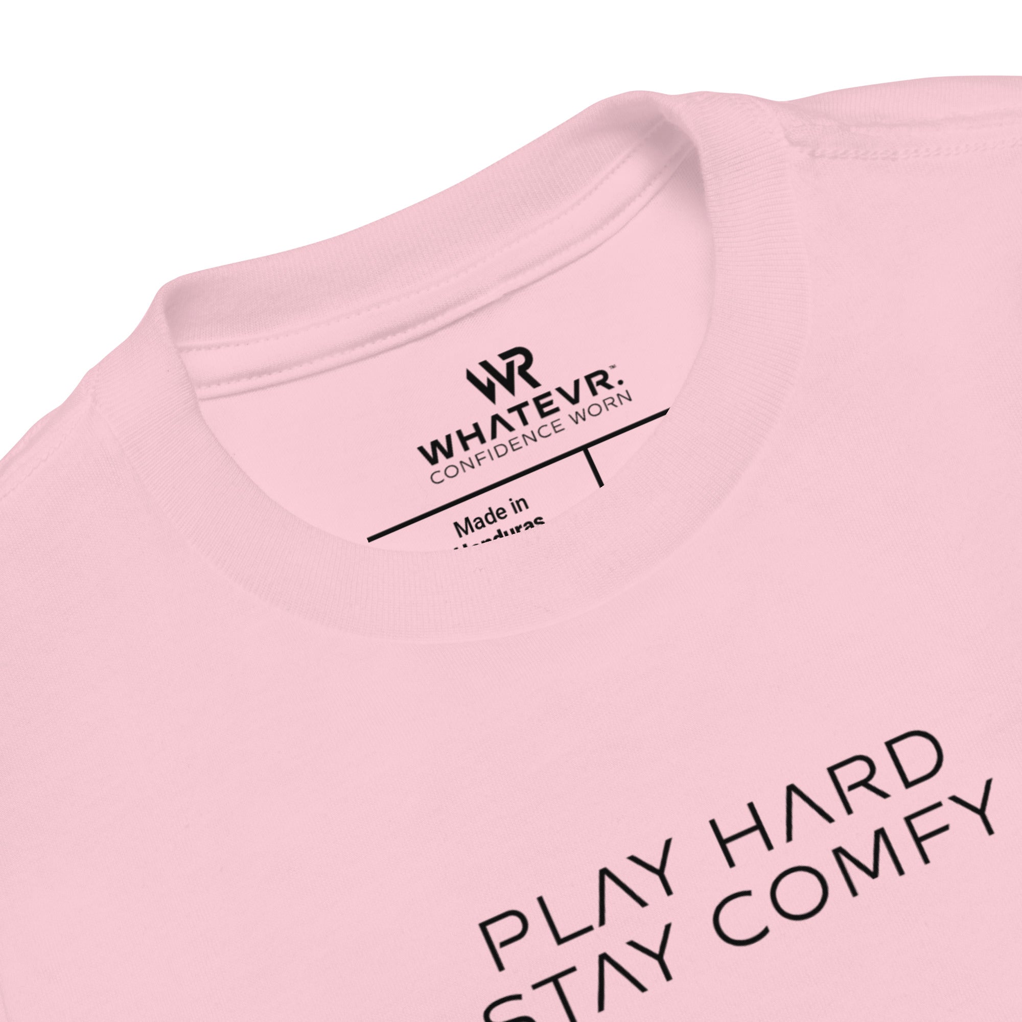 Toddler t-shirt in pink with "Play Hard Stay Comfy" text, front view.