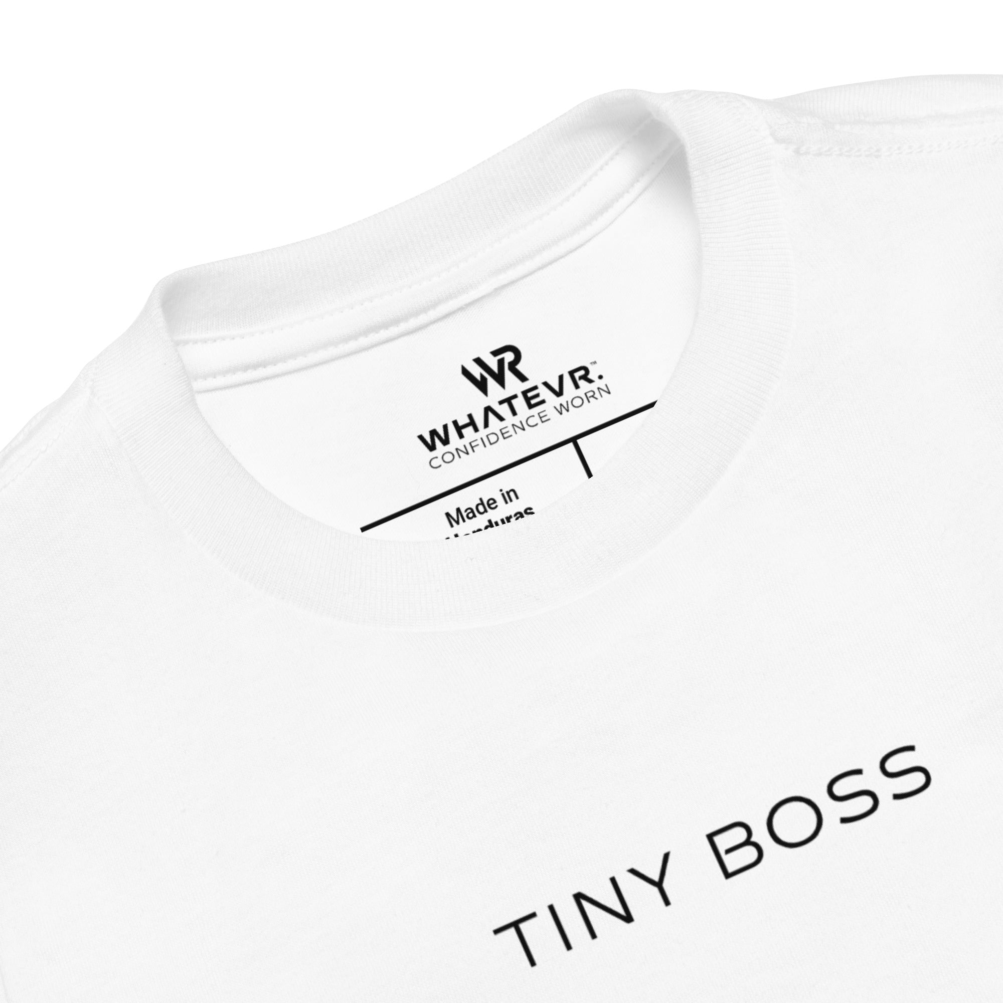Toddler t-shirt in white with "Tiny Boss" text, front view.