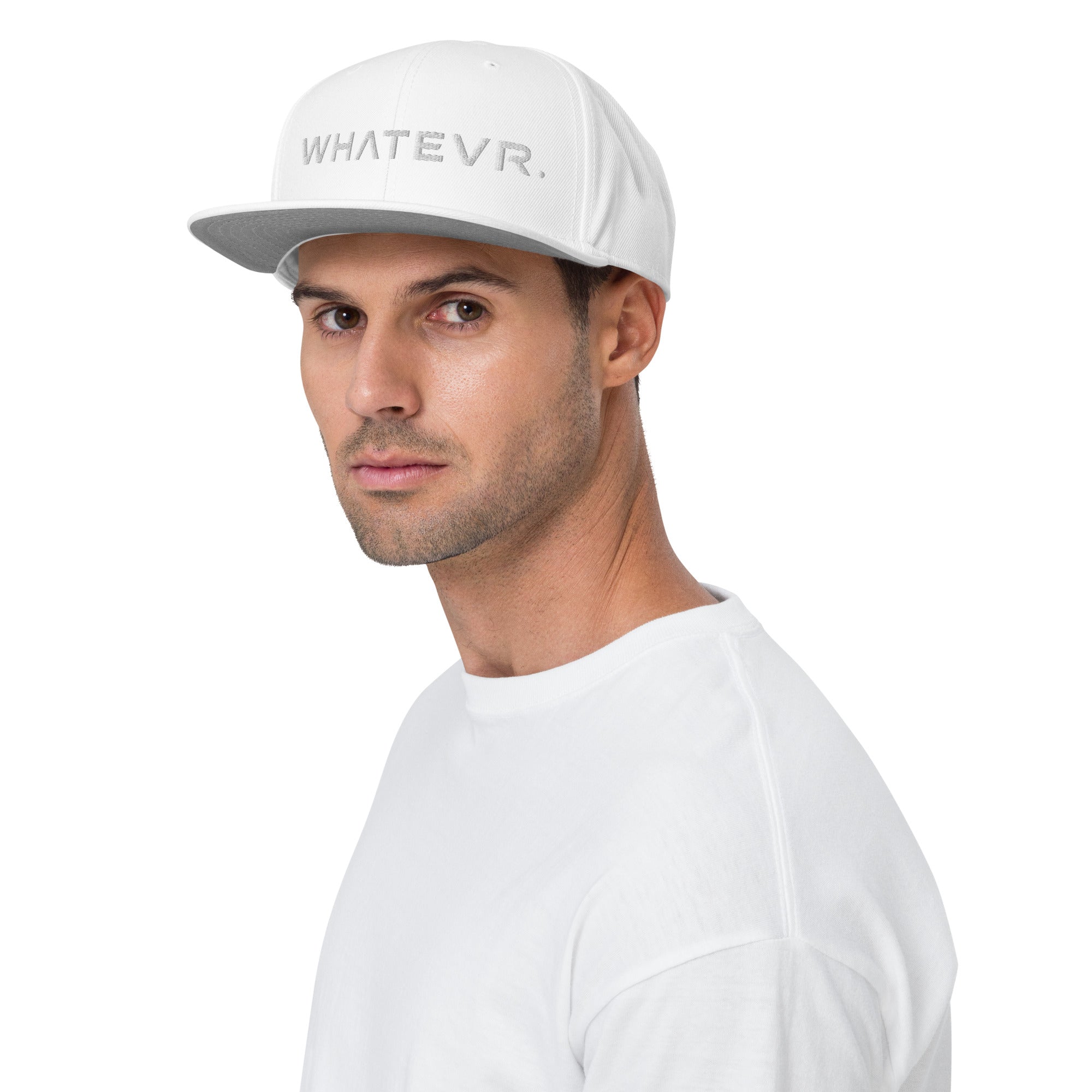 Unisex Tonal snapback hat in white with embroidered WHATEVR text, front view