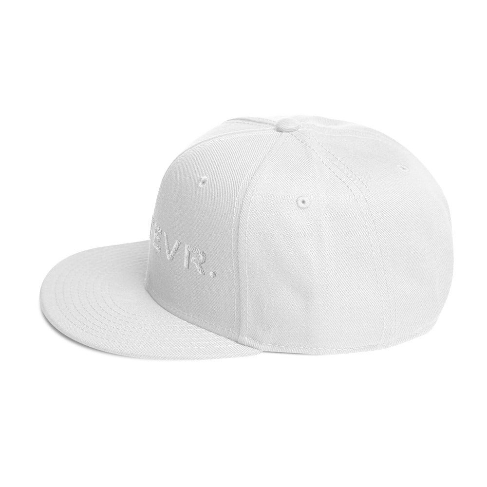 Unisex Tonal snapback hat in white with embroidered WHATEVR text, side view