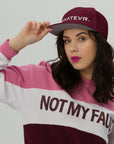 Unisex Unbothered snapback hat in red with embroidered WHATEVR text, front view