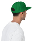Unisex Unbothered snapback hat in green with embroidered WHATEVR text, back view