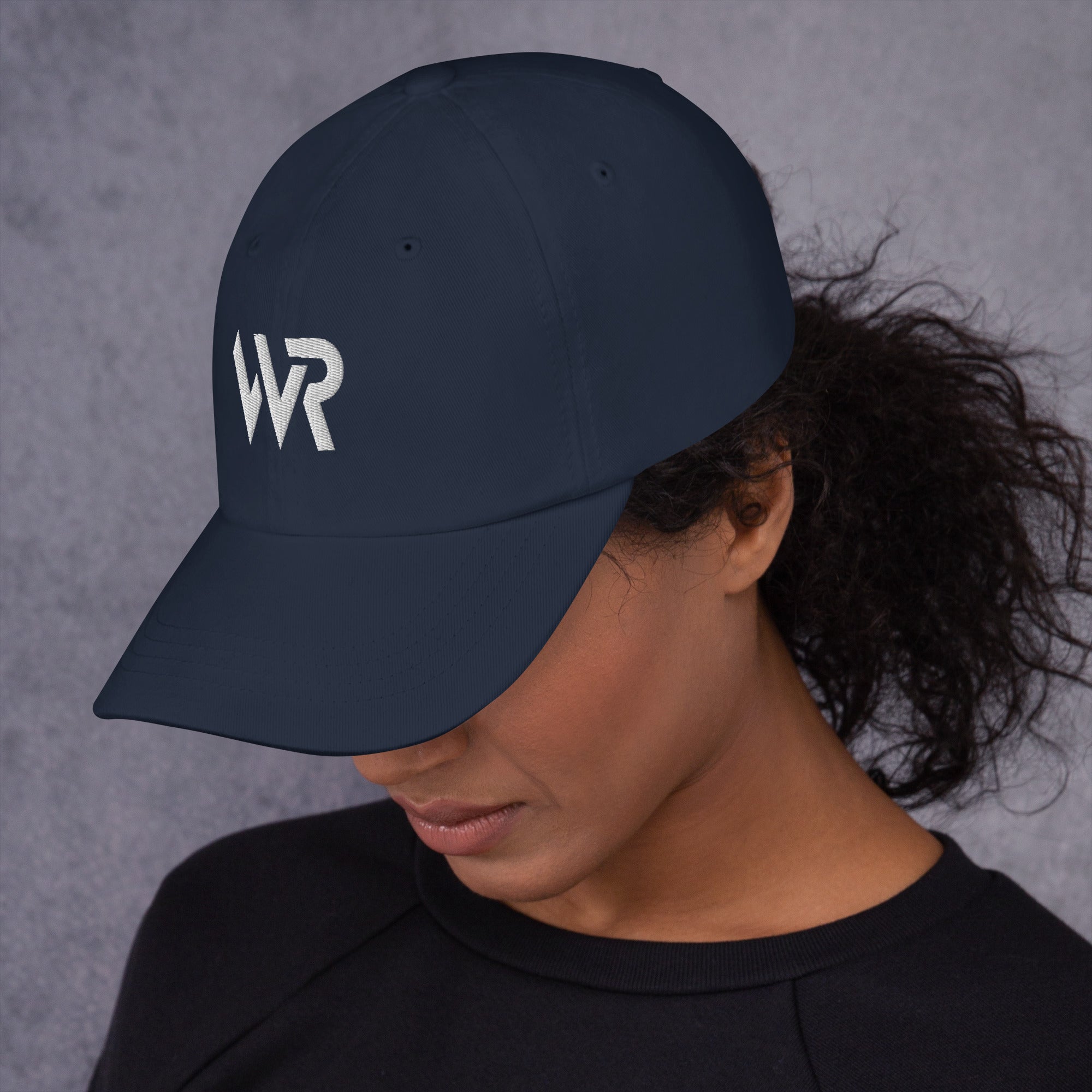 Unisex Classic baseball cap in blue with embroidered WHATEVR logo, front view
