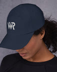 Unisex Classic baseball cap in blue with embroidered WHATEVR logo, front view