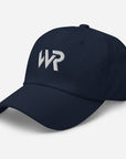 Unisex Classic baseball cap in blue with embroidered WHATEVR logo, front view