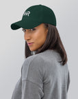 Unisex Classic baseball cap in green with embroidered WHATEVR logo, front view