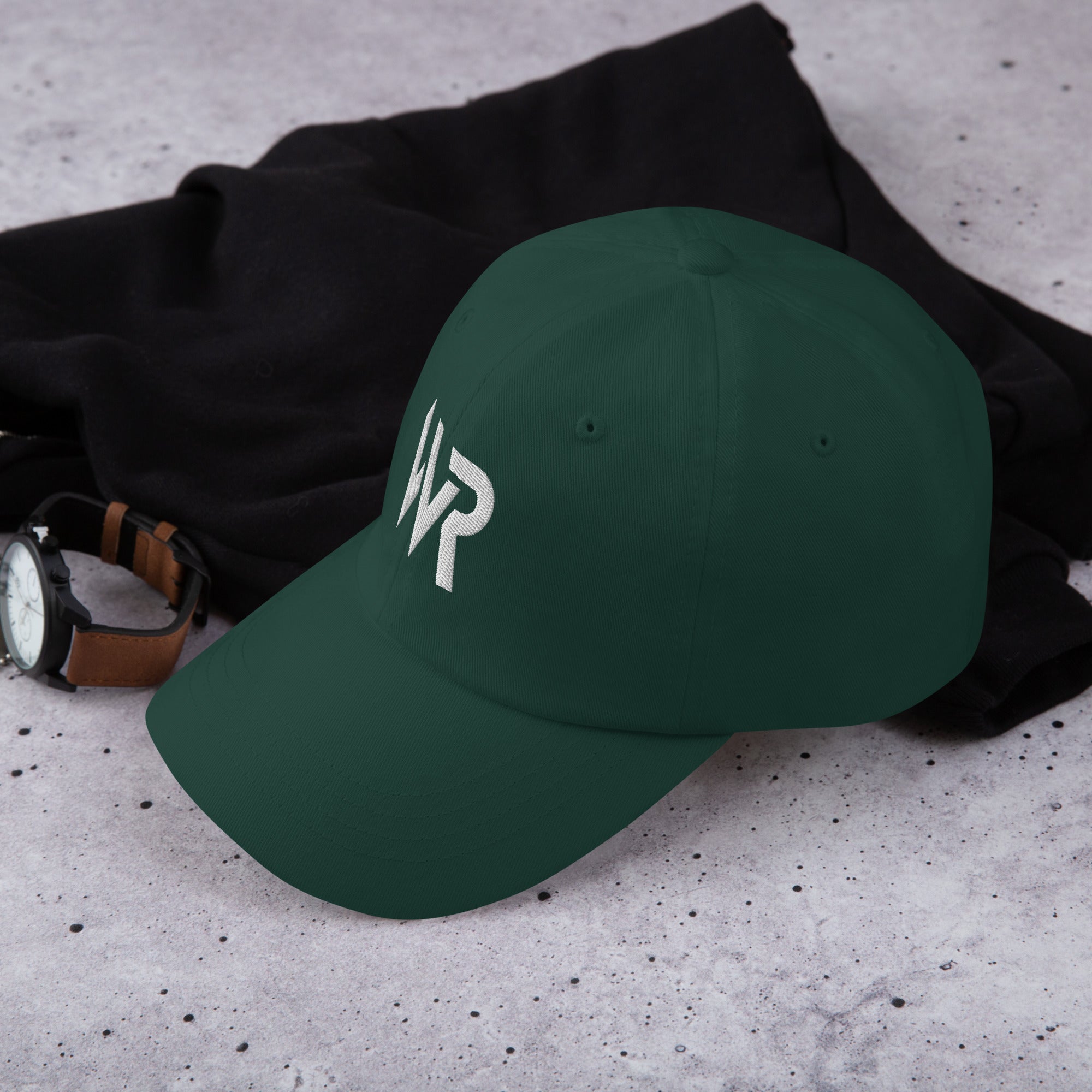 Unisex Classic baseball cap in green with embroidered WHATEVR logo, side view
