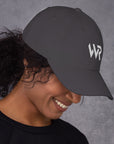 Unisex Classic baseball cap in gray with embroidered WHATEVR logo, side view