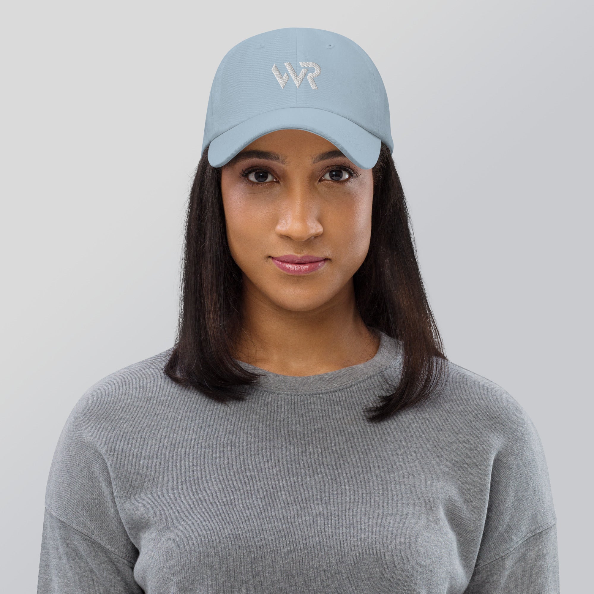 Unisex Classic baseball cap in light blue with embroidered WHATEVR logo, front view