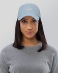 Unisex Classic baseball cap in light blue with embroidered WHATEVR logo, front view