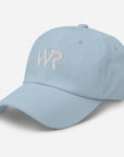 Unisex Classic baseball cap in light blue with embroidered WHATEVR logo, front view