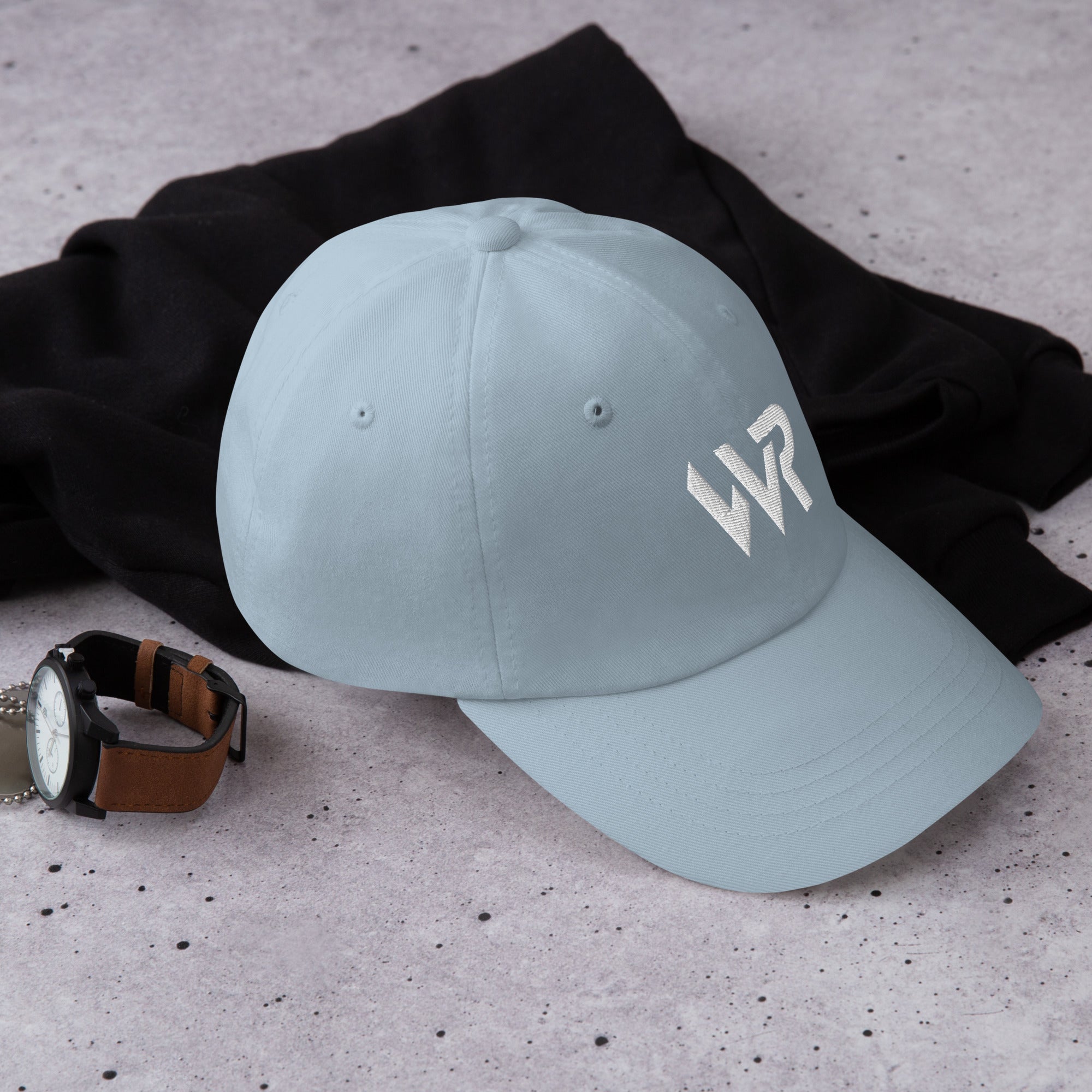 Unisex Classic baseball cap in light blue with embroidered WHATEVR logo, front view