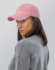 Unisex Classic baseball cap in pink with WHATEVR logo, side view