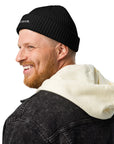 Unisex WHATEVR beanie in black with embroidered detailing, front view