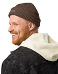 Unisex WHATEVR beanie in brown with embroidered detailing, front view