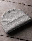 Unisex WHATEVR beanie in gray with embroidered detailing, front view
